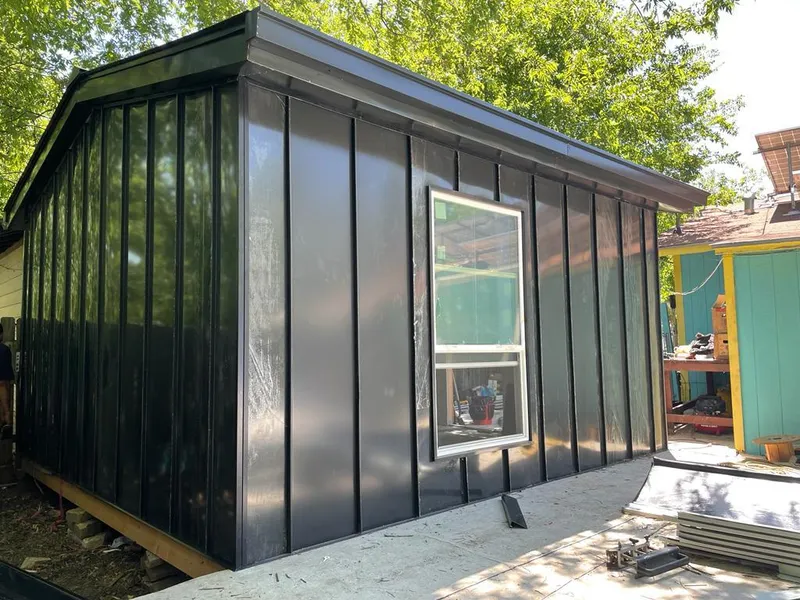 Black standing seam metal wall panels for Roof Inspection in Somers