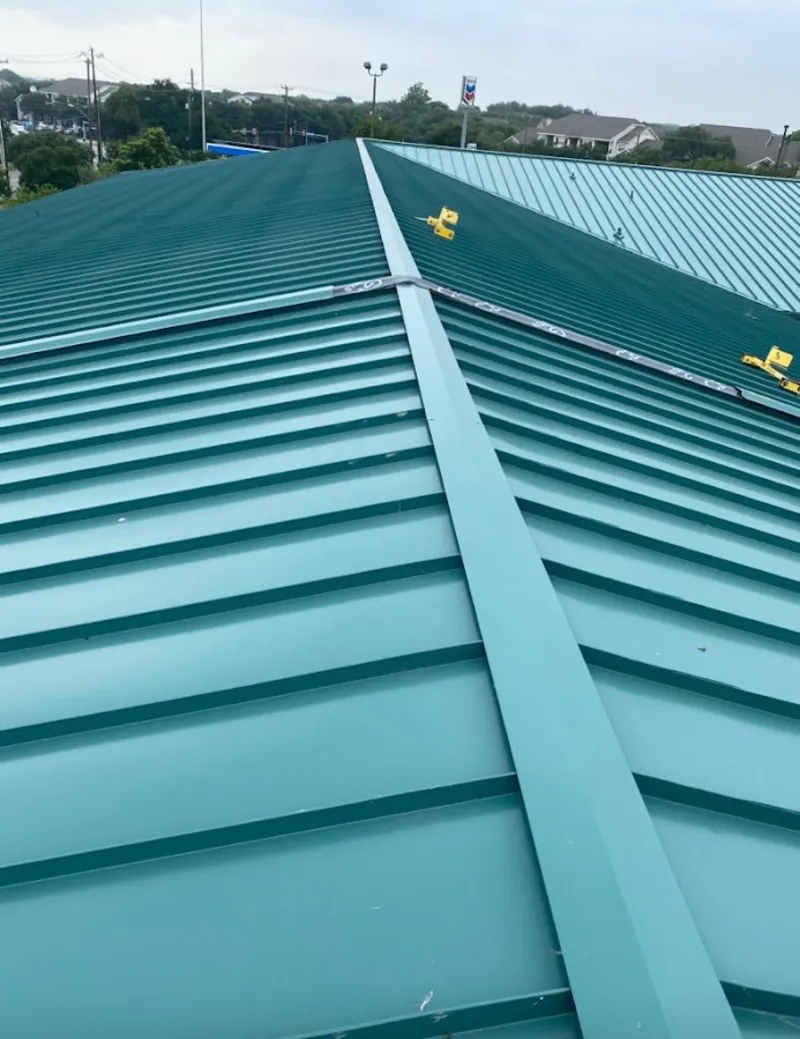 Green commercial metal roof ridge and valley for Metal Roof Repair in Somers